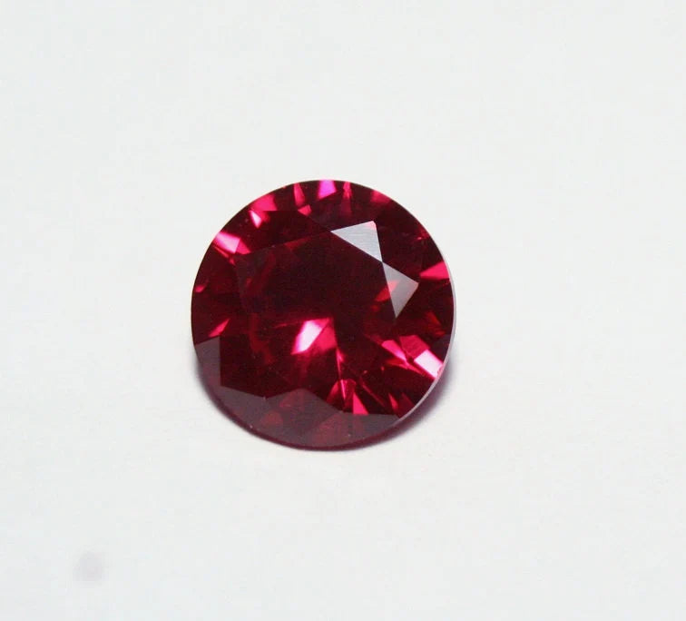 Lab Created Ruby 10mm Scintillating Precision Cut Brilliant Round AAA Swiss 4.3ct