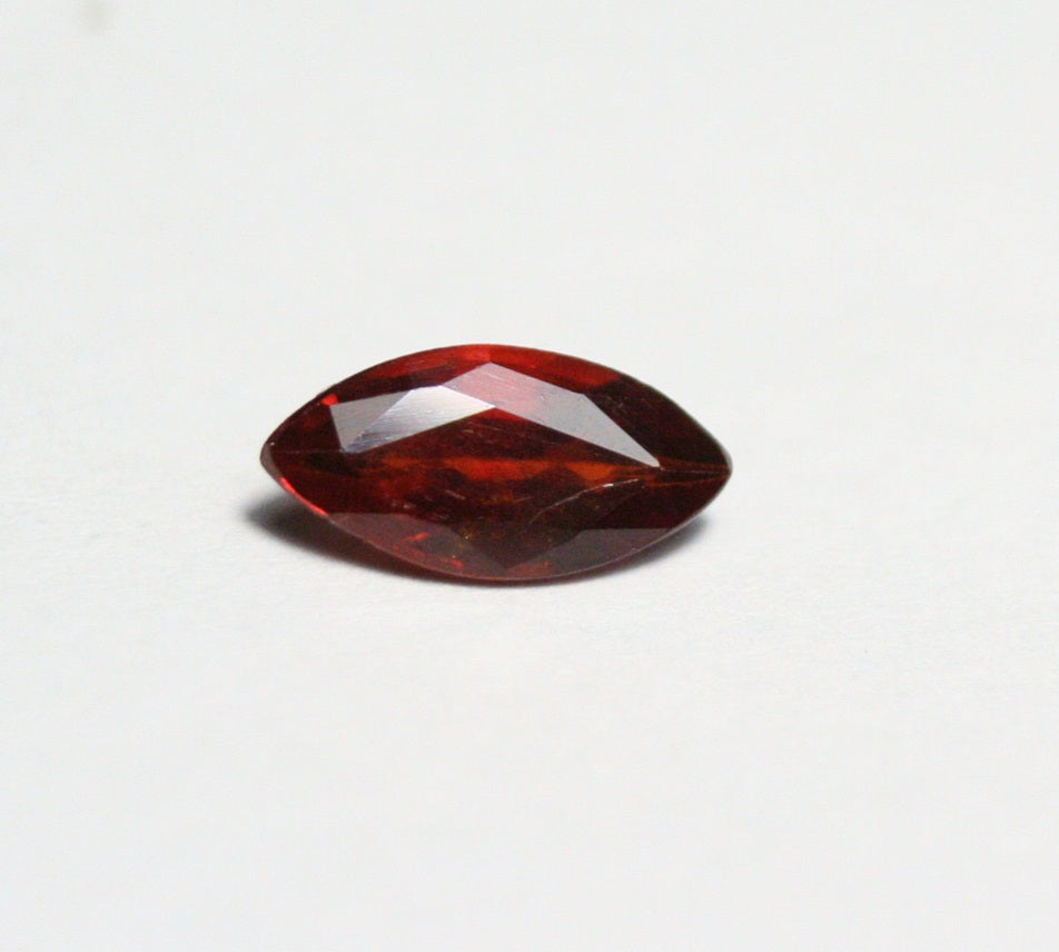 Clinohumite 0.73ct Ultra Rare Deep Orange / Red Faceted Gem - Pakistan 8x4mm