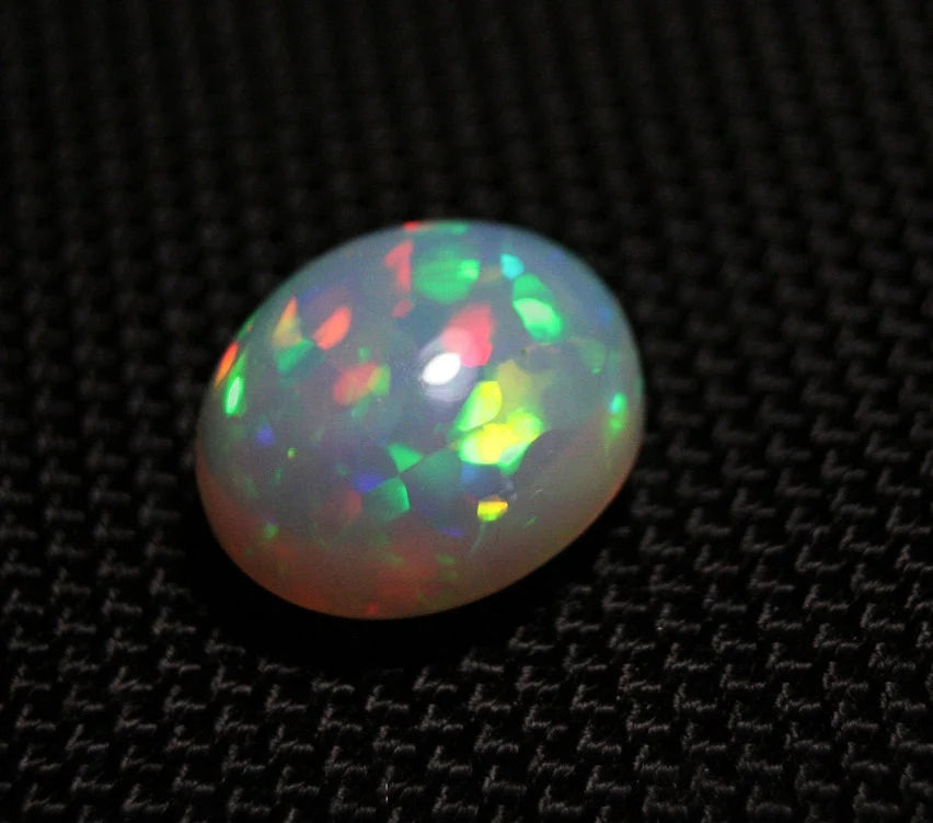 Welo Grey Base Opal Cabochon 7.77ct Harlequin Swirl Natural Opal Ethiopia Video AAA