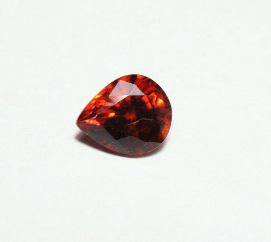 Clinohumite 0.66ct Ultra Rare Orange / Red Faceted Gem - Pakistan 6x5mm