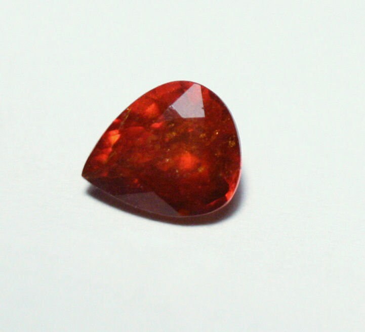 Clinohumite 0.65ct Ultra Rare Orange / Red Faceted Gem - Pakistan 6x5mm