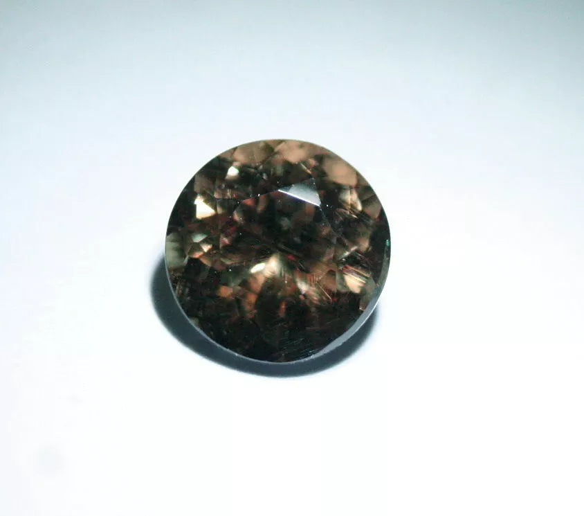 Colour Change Garnet 1.69ct Round Cut Gem with Rare Colour Change Tanzania 6x6mm