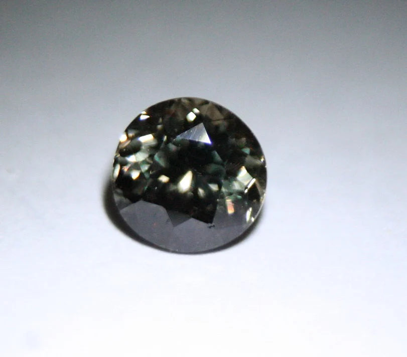 Colour Change Garnet 0.94ct Round Cut Gem Rare Superb Colour Change 5x5mm