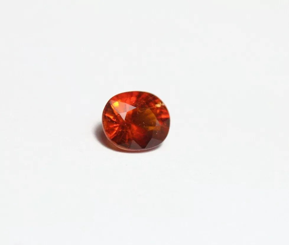 Clinohumite 0.57ct Ultra Rare Deep Orange Faceted Natural Gem Pakistan 5x4mm