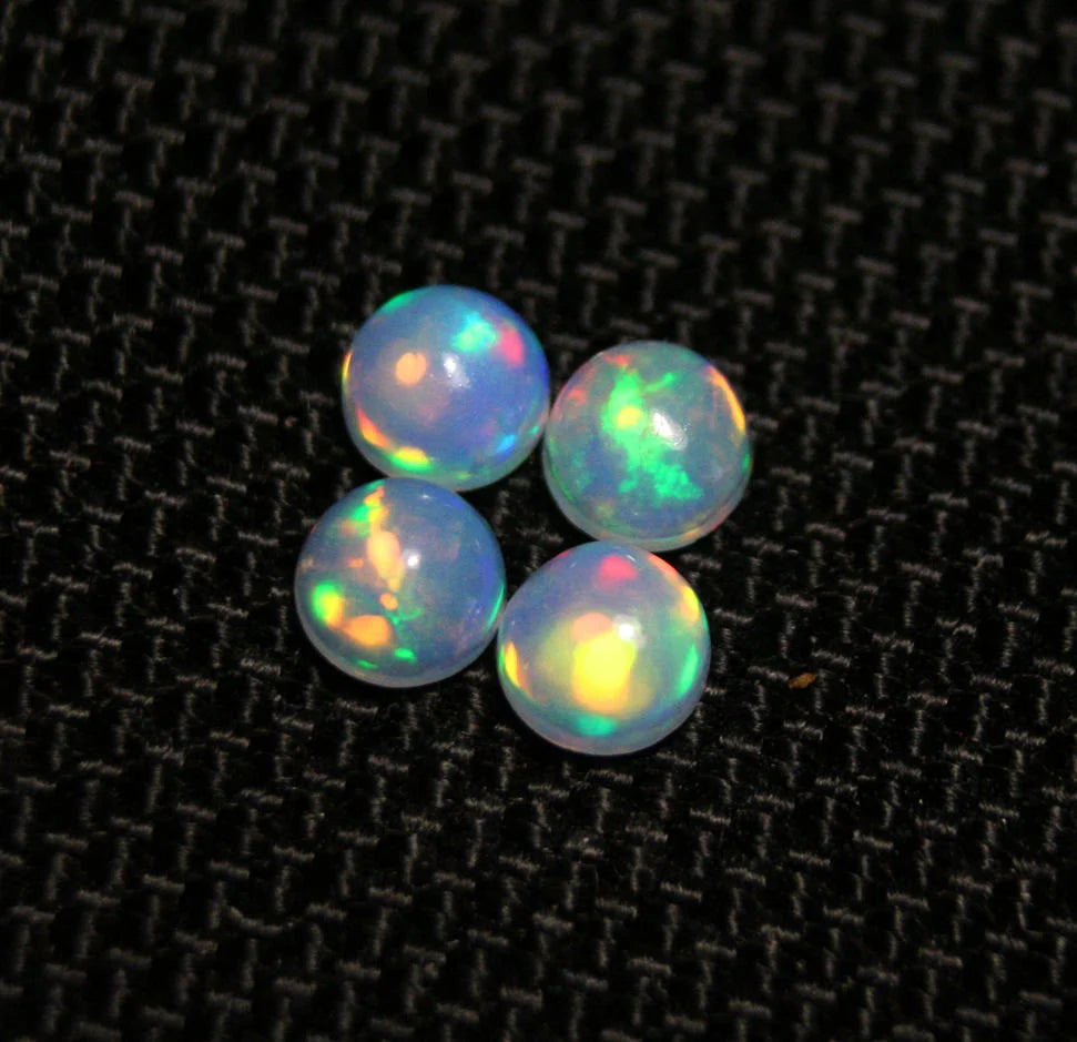 Welo Crystal Opal Round 5x5mm Rainbow Cabochons 4pc Lot 1.35ct AAA Jelly Opal