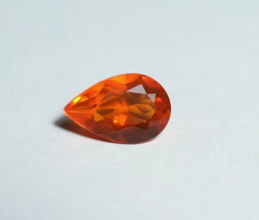 Faceted Orange Mexican Fire Opal 0.65ct Pear Cut Natural Opalescent 8x5mm