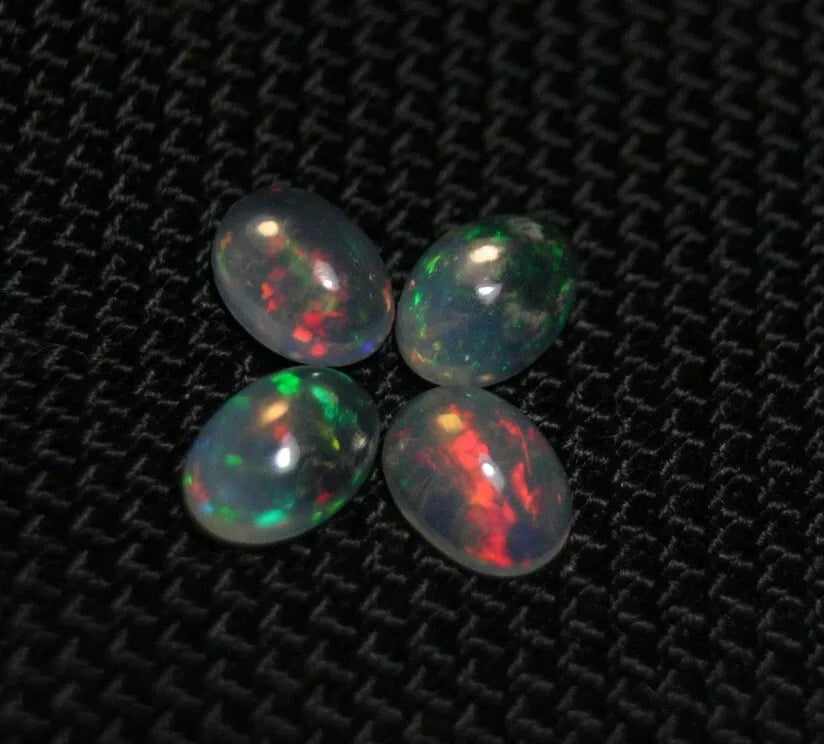 Welo Opal Cabochon Rainbow Flash 7x5mm 4pc Lot 2.27ct Natural Opal Ethiopia