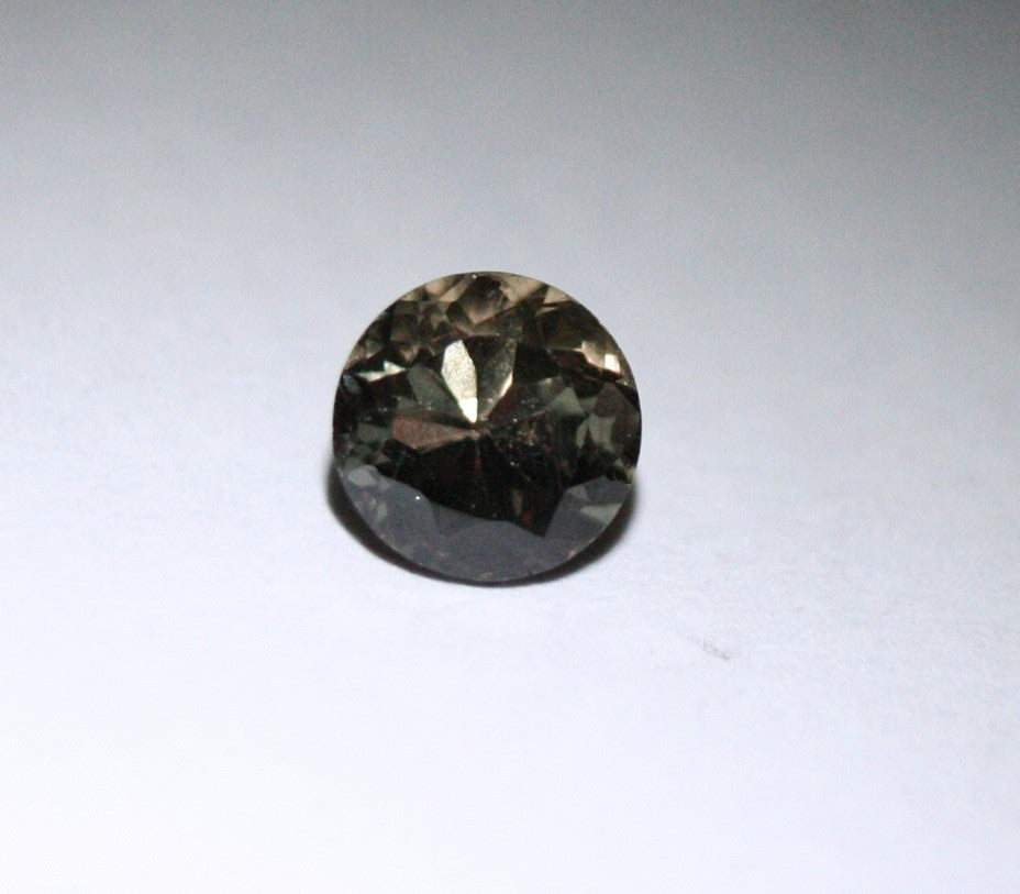 Colour Change Garnet 0.83ct Round Cut Fine Gem Rare Superb Colour Change 5x5mm