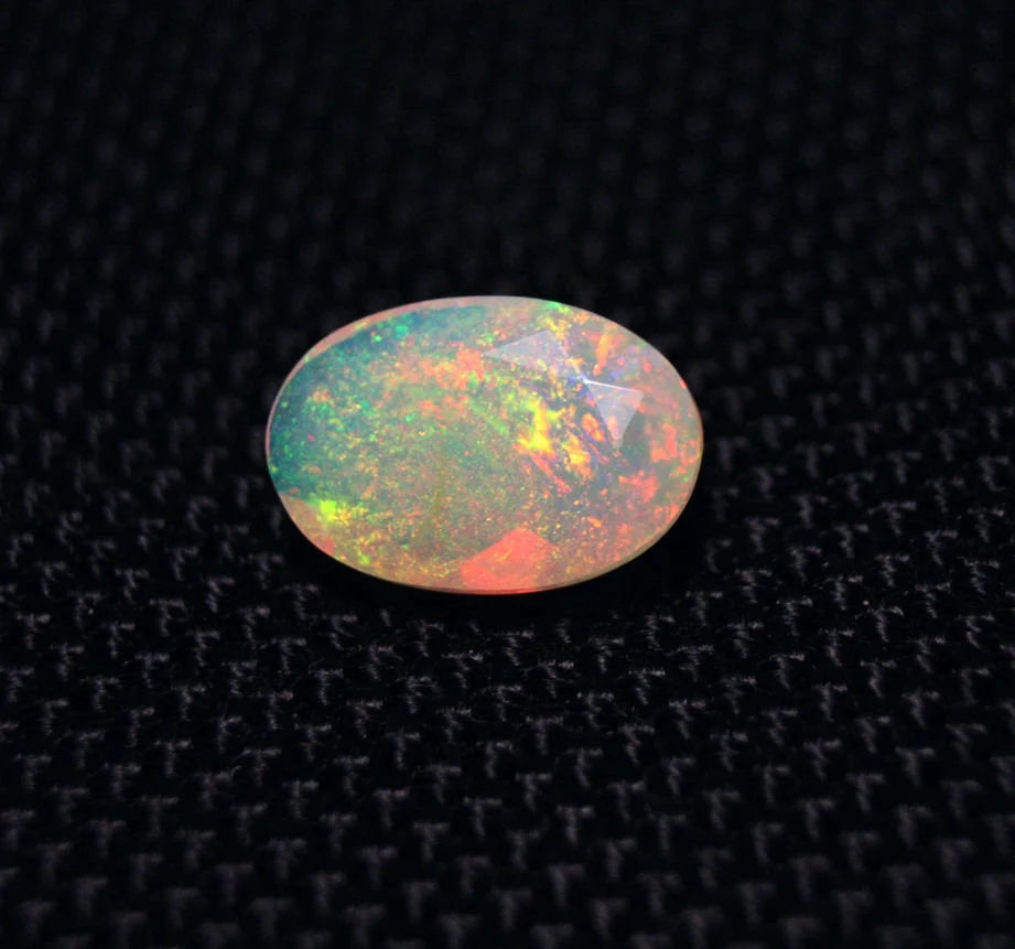 Faceted Welo Opal 2.2ct Rainbow Confetti Blaze Natural Ethiopian Opal 12x8mm Video AAA