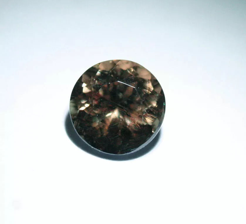 Colour Change Garnet 1.69ct Round Cut Gem with Rare Colour Change Tanzania 6x6mm