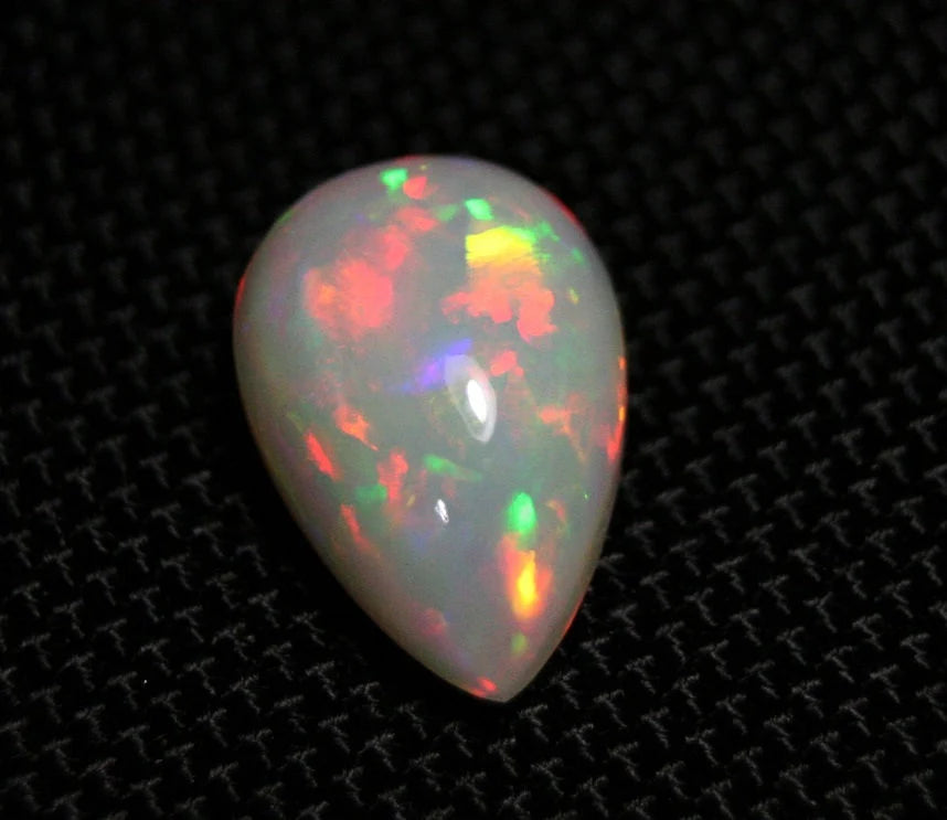 Welo Precious Opal Cabochon 9.7ct Rainbow Blaze Pear AAA Natural Ethiopian Video