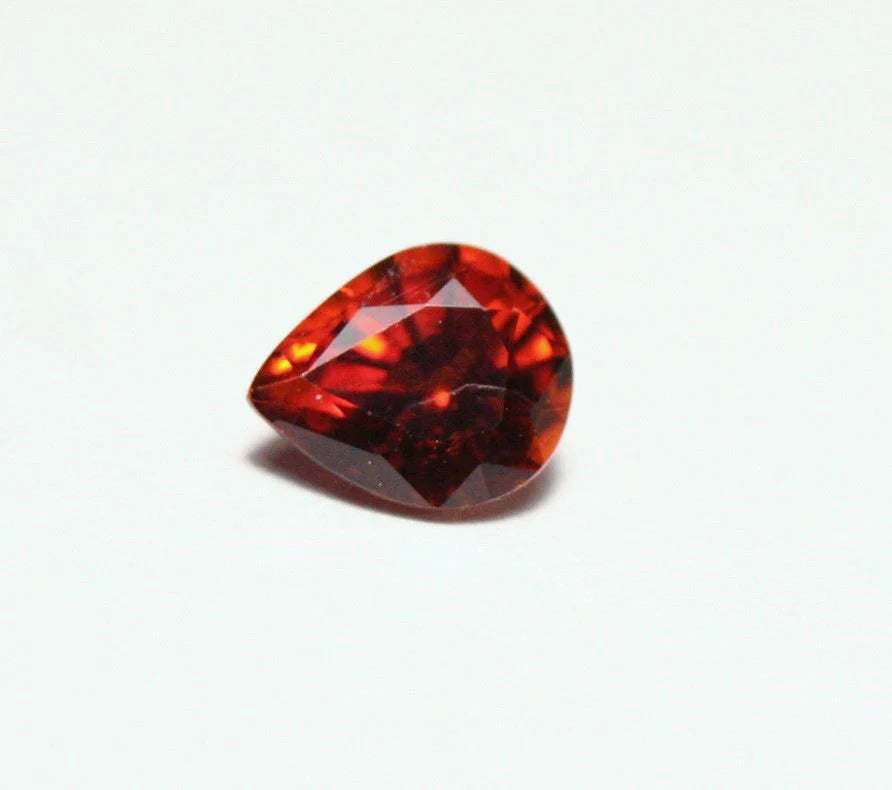 Clinohumite 0.66ct Ultra Rare Orange / Red Faceted Gem - Pakistan 6x5mm