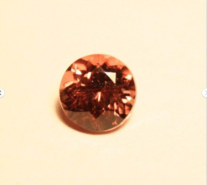 Colour Change Garnet 0.8ct Round Cut Rare Scintillating Gem Tanzania 5x5mm AAA