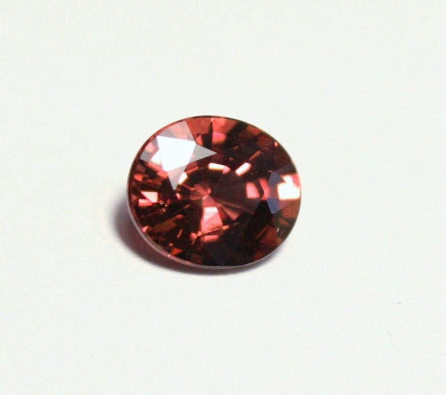 Rare Purplish Orange Malaya Colour Change Garnet 1.32ct Scintillating Oval Cut Madagascar