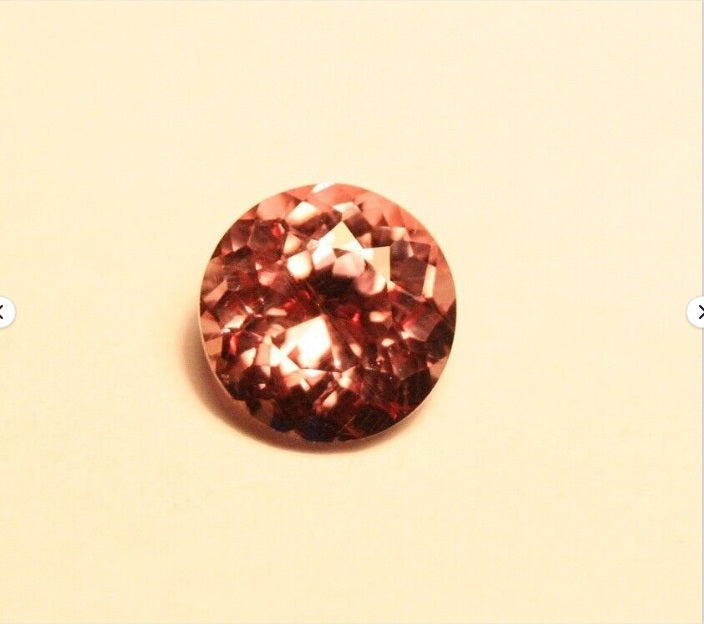 Colour Change Garnet 1.17ct Round Cut Rare Scintillating Gem Tanzania 6x6mm AAA