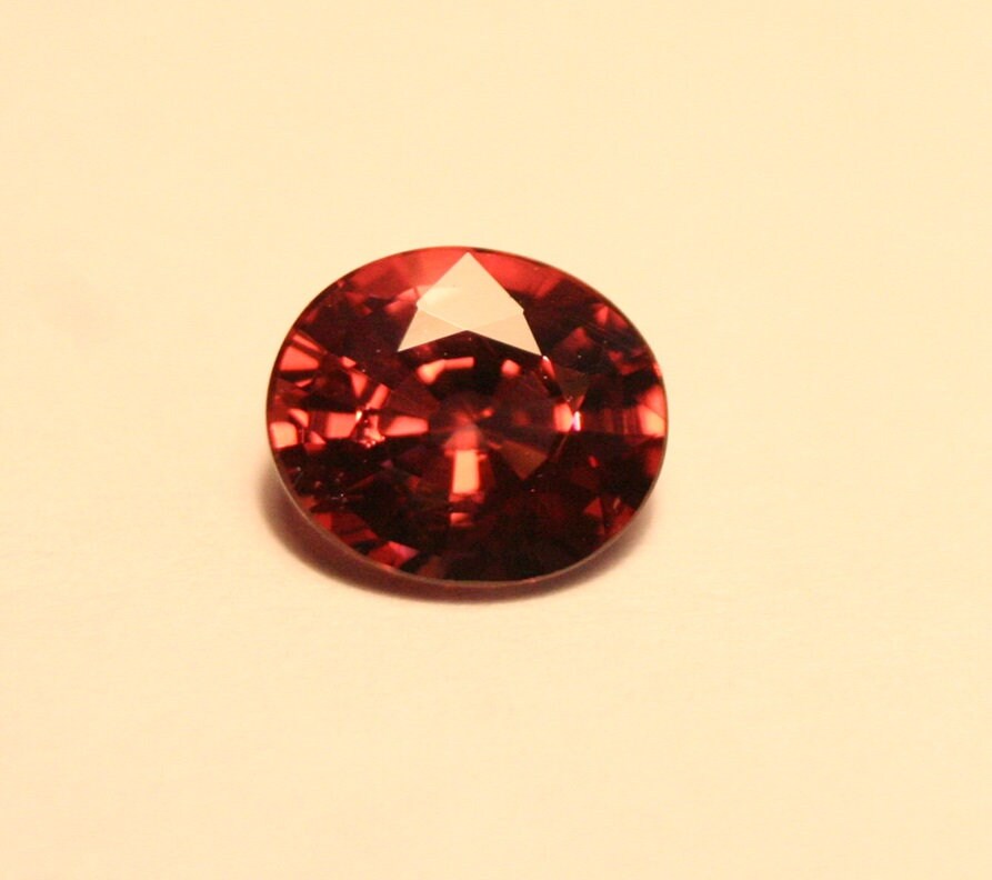 Rare Purplish Orange Malaya Colour Change Garnet 1.32ct Scintillating Oval Cut Madagascar