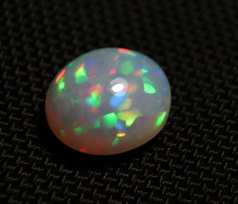 Welo Grey Base Opal Cabochon 7.77ct Harlequin Swirl Natural Opal Ethiopia Video AAA