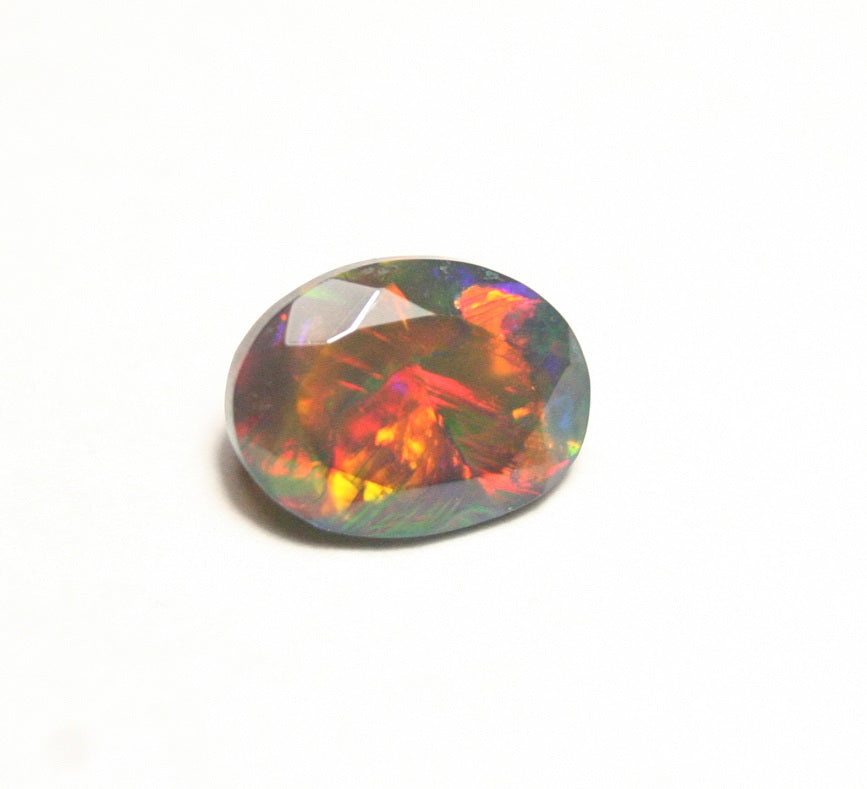 1.24ct Faceted Black Natural Welo Opal Stunning Neon Rainbow AAA Jelly Opal 9x7 clearwatergems