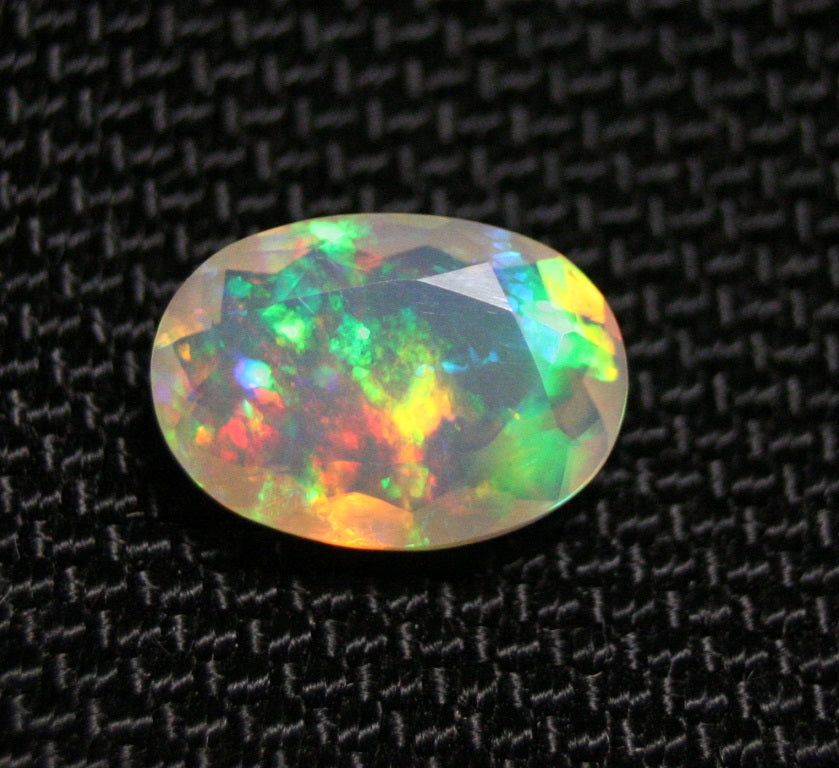 2.26ct Faceted Welo Opal Rainbow Blaze AAA Natural Crystal Jelly Opal 12x9mm - See Video