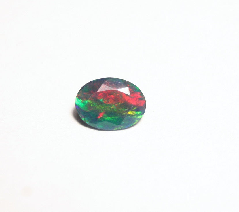 0.7ct Faceted Black Natural Welo Opal Stunning Neon Rainbow Flash AAA Jelly Opal