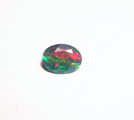 0.7ct Faceted Black Natural Welo Opal Stunning Neon Rainbow Flash AAA Jelly Opal