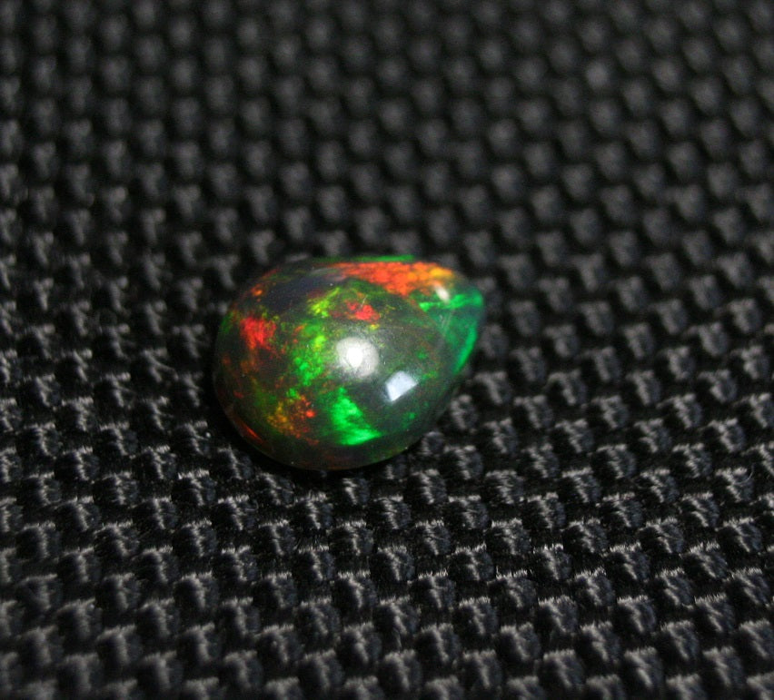 1.66ct Black Welo Opal Cabochon Stunning Rainbow Flash Pear AAA Natural Ethiopian Opal 10x8mm