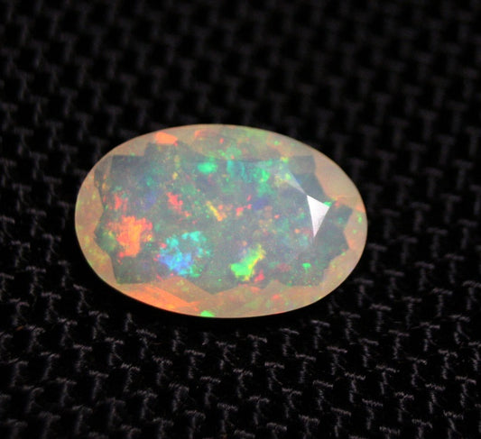 Faceted Welo Opal 2.43ct Neon Oval AAA Natural Crystal Jelly Opal 14x9mm Video