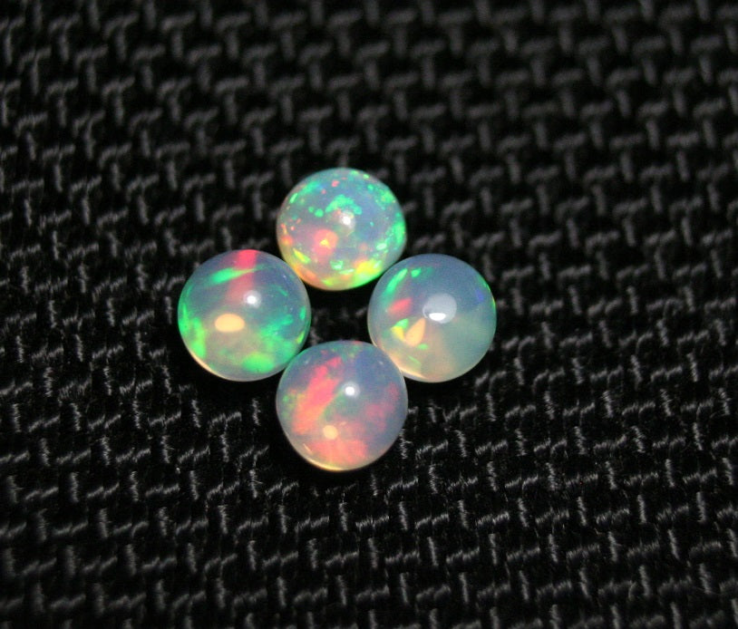 Welo Opal Crystal Ball 4pc Lot 1.32ct Neon Spheres Natural Ethiopian Opal 4x4mm