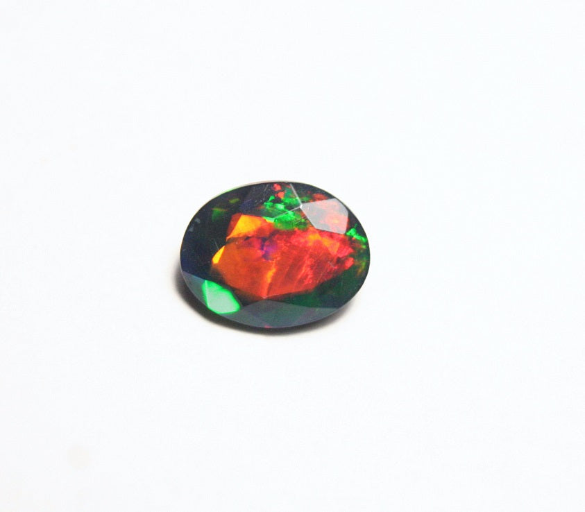 1.38ct Faceted Black Natural Welo Opal Stunning Neon Rainbow Flash AAA Jelly Opal