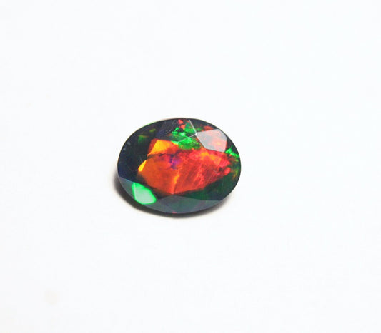 1.38ct Faceted Black Natural Welo Opal Stunning Neon Rainbow Flash AAA Jelly Opal