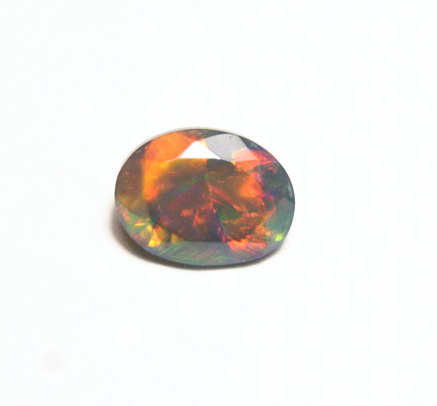 1.24ct Faceted Black Natural Welo Opal Stunning Neon Rainbow AAA Jelly Opal 9x7 clearwatergems