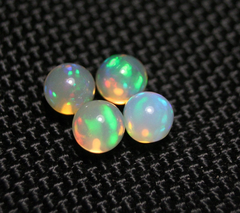 Welo Opal Crystal Ball 4pc Lot 2.7ct Neon Spheres Natural Ethiopian Opal 5x5mm