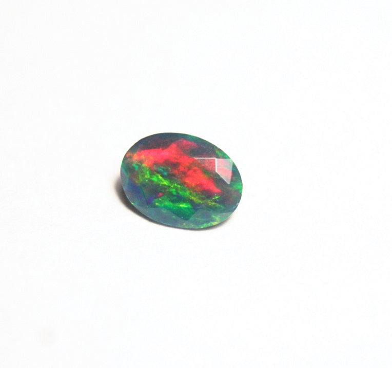 0.7ct Faceted Black Natural Welo Opal Stunning Neon Rainbow Flash AAA Jelly Opal