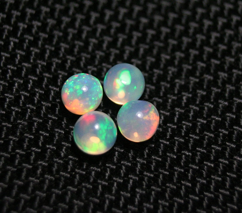 Welo Opal Crystal Ball 4pc Lot 1.32ct Neon Spheres Natural Ethiopian Opal 4x4mm