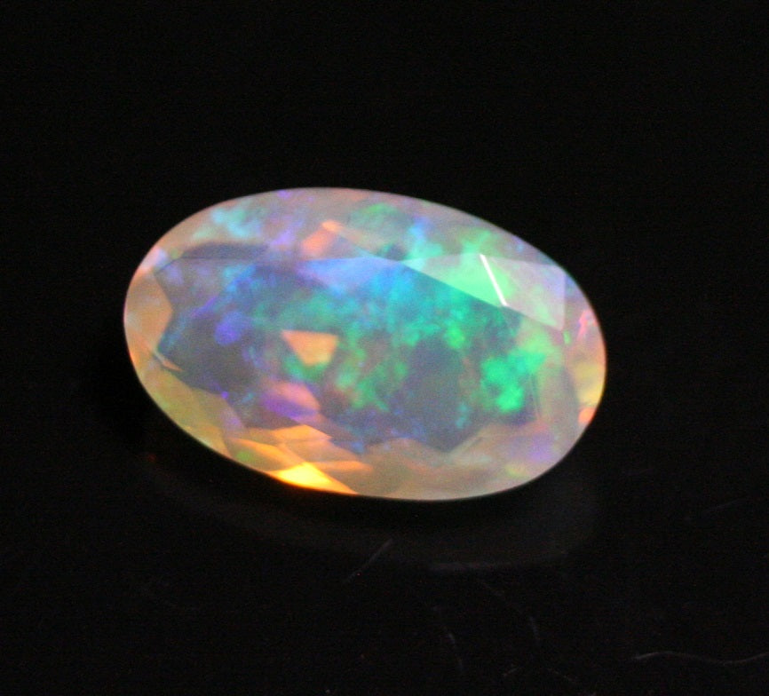 Faceted Welo Opal 2.1ct Rainbow Blaze AAA Natural Crystal Jelly Opal 12x7mm - See Video