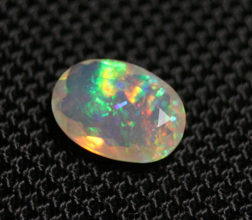 2.26ct Faceted Welo Opal Rainbow Blaze AAA Natural Crystal Jelly Opal 12x9mm - See Video