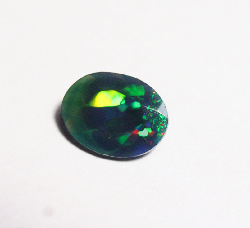 1.5ct Faceted Black Natural Welo Opal Stunning Neon Flash AAA Jelly Opal 11x8