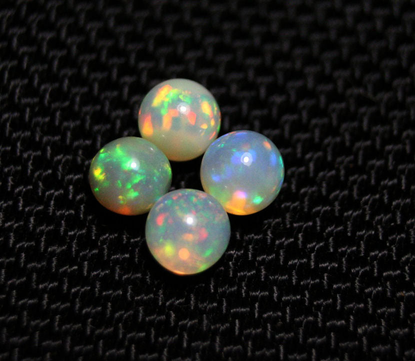 Welo Opal Crystal Ball 4pc Lot 2.34ct Neon Spheres Natural Ethiopian Opal 5x5mm