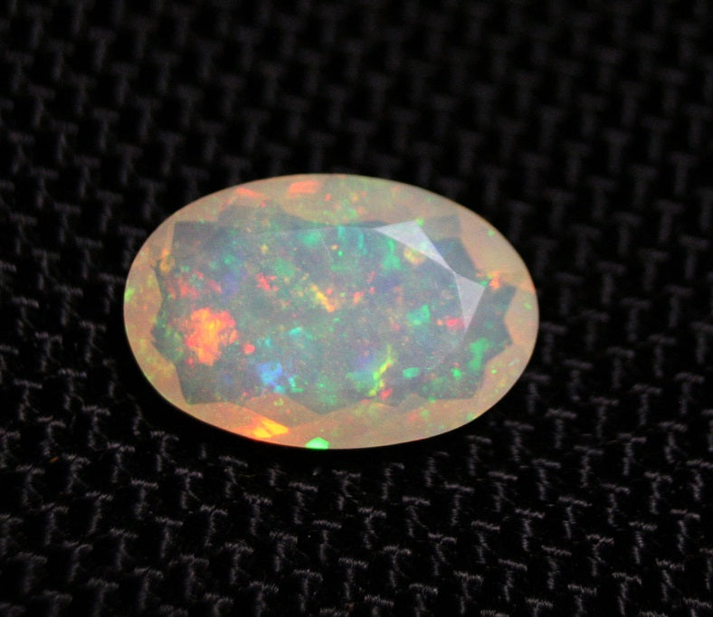 Faceted Welo Opal 2.43ct Neon Oval AAA Natural Crystal Jelly Opal 14x9mm Video