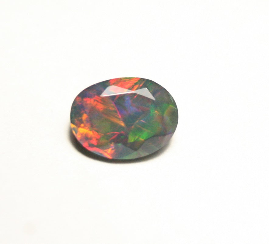 1.24ct Faceted Black Natural Welo Opal Stunning Neon Rainbow AAA Jelly Opal 9x7 clearwatergems