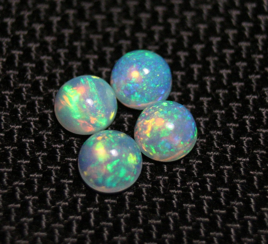 Welo Crystal Opal Round 5x5mm Cabochons 4pc Lot 1.58ct AAA Jelly Opal