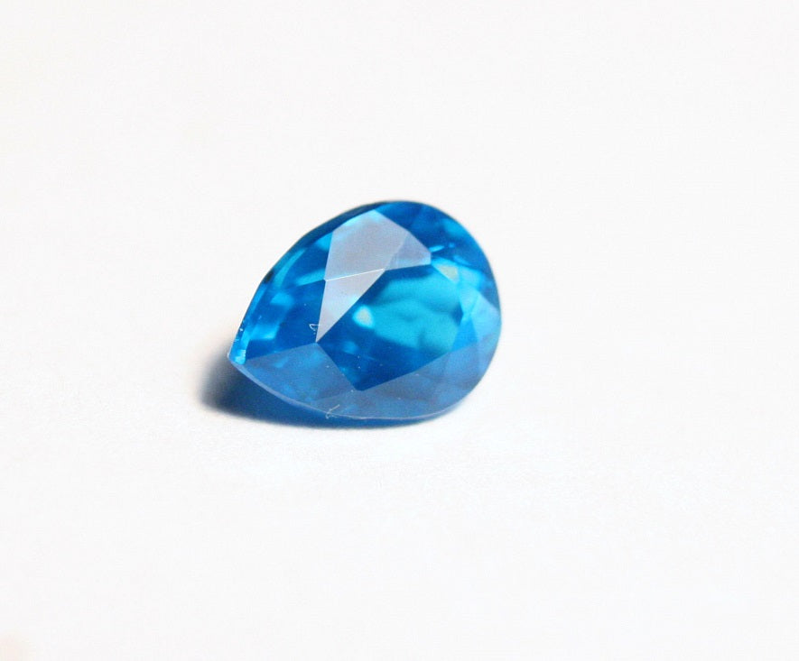 1.06ct Neon Blue Apatite Vibrant Pear Cut Lagoon Blue Gemstone Tanzania 7x6mm