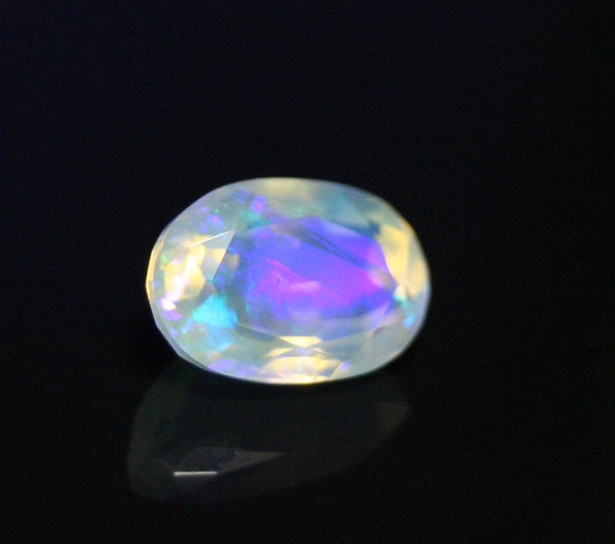 Faceted Welo Opal 1.38ct Neon Violet AAA Natural Crystal Jelly Opal 10x7mm - See Video