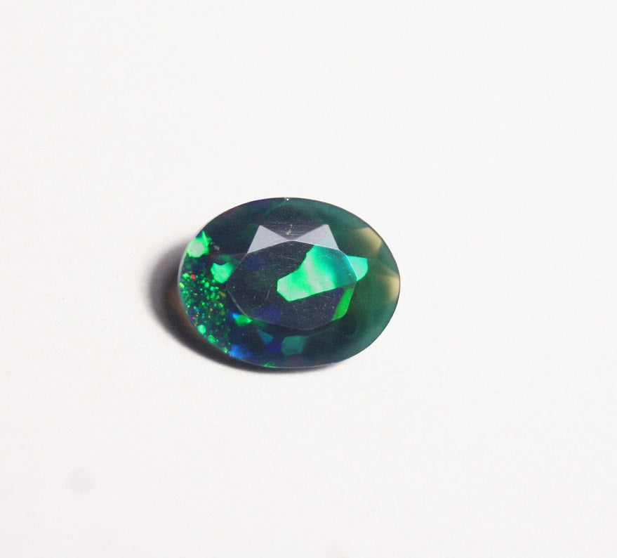 1.5ct Faceted Black Natural Welo Opal Stunning Neon Flash AAA Jelly Opal 11x8