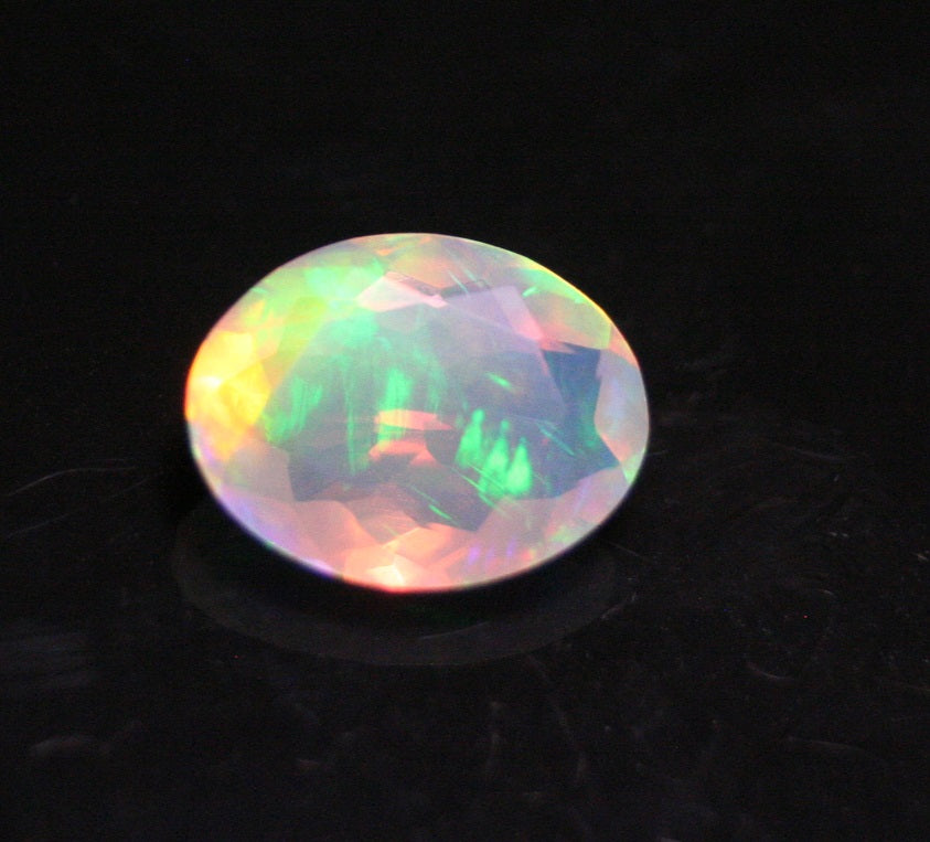 Faceted Welo Opal 1.75ct Rainbow Blaze AAA Natural Crystal Jelly Opal 11x8mm - See Video