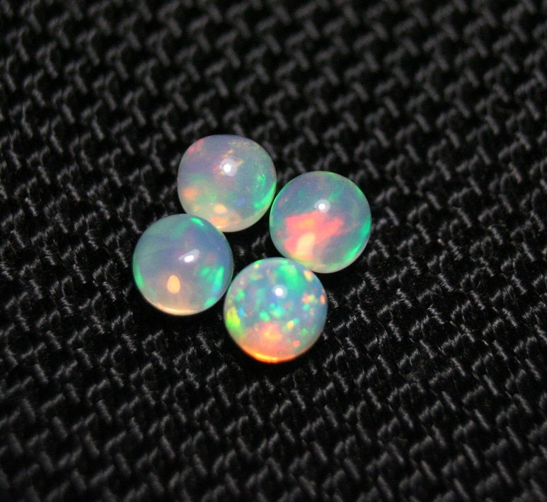 Welo Opal Crystal Ball 4pc Lot 1.32ct Neon Spheres Natural Ethiopian Opal 4x4mm