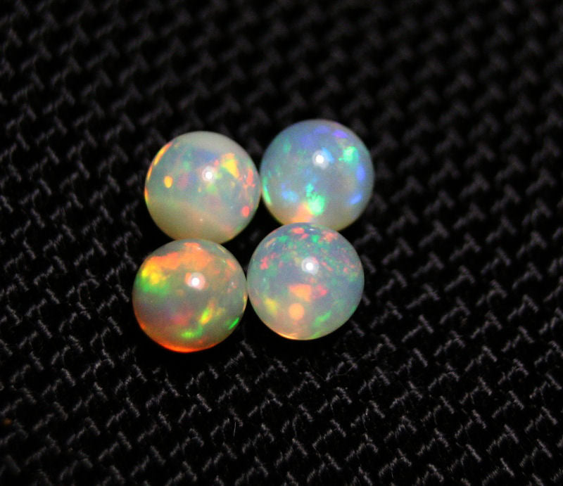 Welo Opal Crystal Ball 4pc Lot 2.34ct Neon Spheres Natural Ethiopian Opal 5x5mm