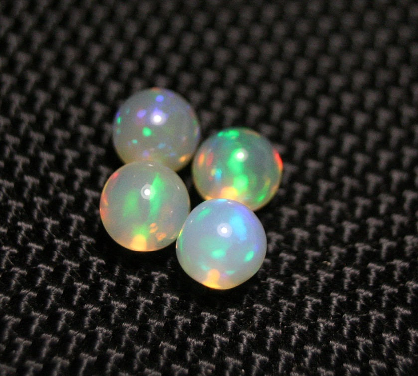 Welo Opal Crystal Ball 4pc Lot 2.7ct Neon Spheres Natural Ethiopian Opal 5x5mm