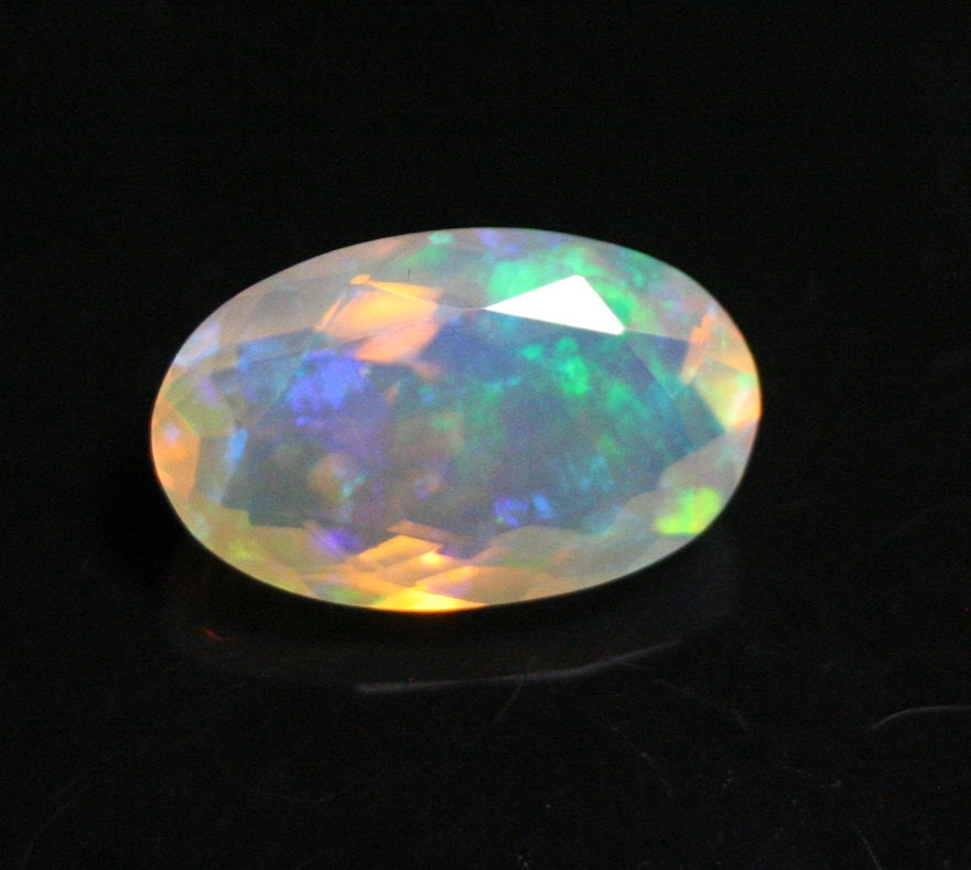 Faceted Welo Opal 2.1ct Rainbow Blaze AAA Natural Crystal Jelly Opal 12x7mm - See Video