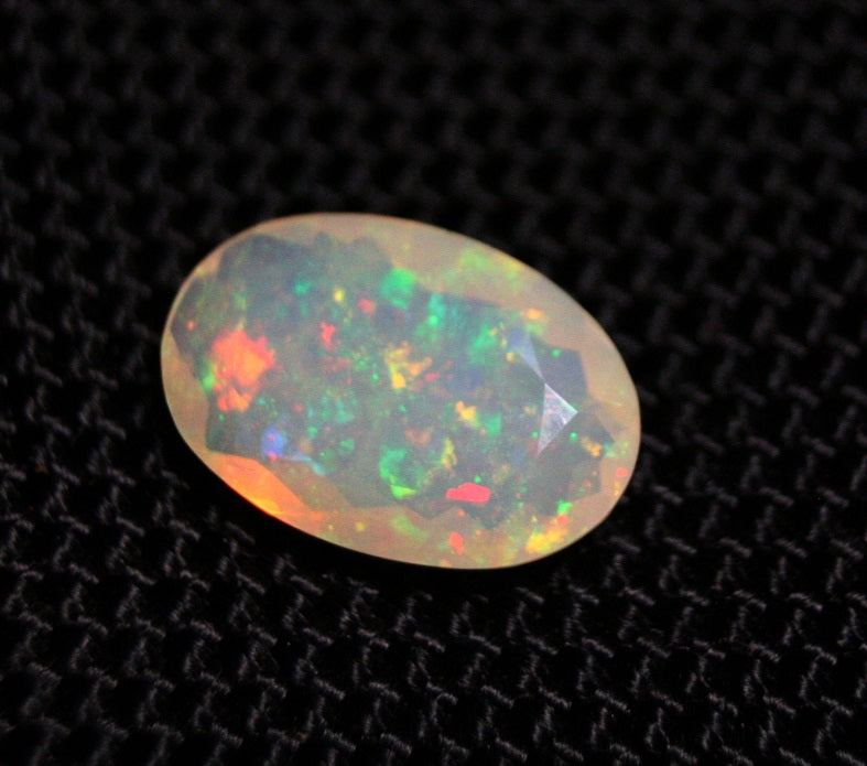 Faceted Welo Opal 2.43ct Neon Oval AAA Natural Crystal Jelly Opal 14x9mm Video